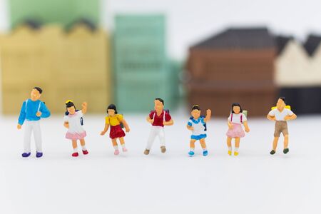 Miniature children : Group children standing with town center. Image use for study international, back to school concept.の写真素材