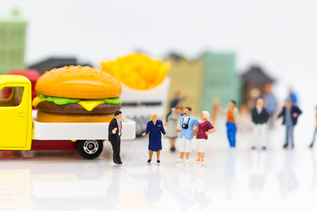 Miniature people: Group people talking about marketing, Trading business. Image use for Franchise business concept.の写真素材