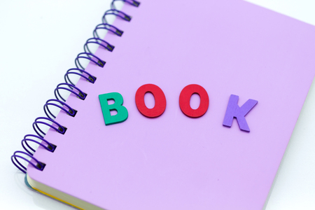 Purple book with pen. Image use for learning, education, memory concept.の写真素材