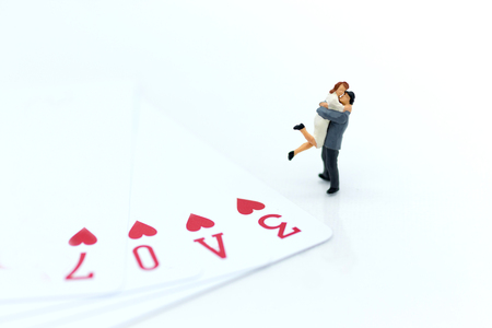 Miniature people: Couple hug each other to show love. Image use for Valentine's day concept.の写真素材
