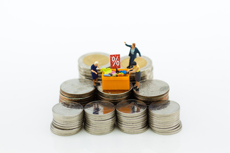 Miniature people : Shoppers with discount for shopping items. Image use for shopping business concept.の写真素材