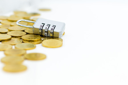 Security key and coins. Image use for background key business to success concept.の写真素材