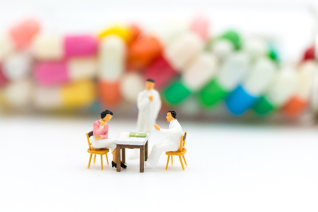 Miniature people: Annual Health Check with the doctor. Image use for Health check concept.の写真素材