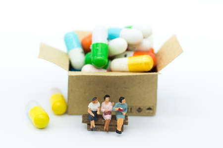 Miniature people: Meet the doctor for women's health. Image use for Health check concept.の写真素材