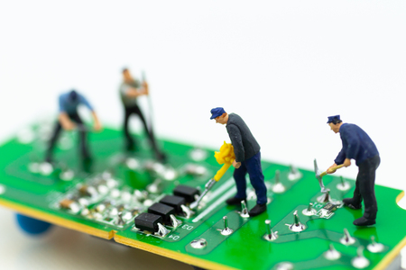 Miniature worker repairing mainboard, clear virus computer and repair, security and technology...