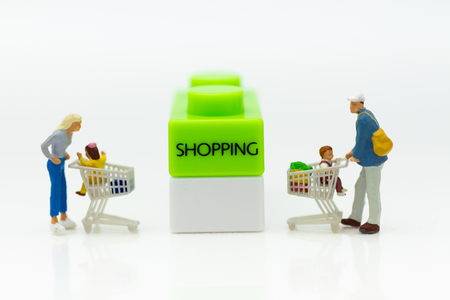 Miniature people: Shopper in shopping mall, image use for background business, marketing concept.の写真素材