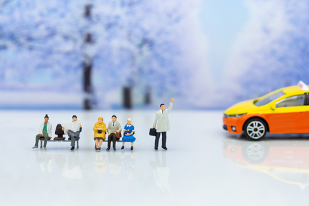 Miniature people: passenger waiting vehicle for go to destination, transportation. Image use for business background concept.の写真素材