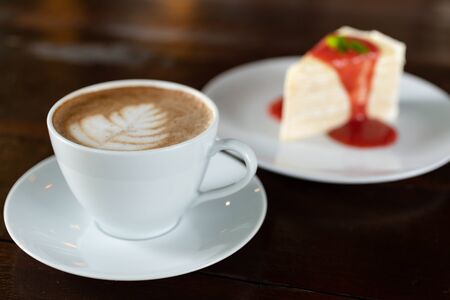 Coffee cup with Cake , image use for charge your energy in the morningの写真素材