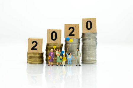 Miniature family, children holding colorful balloon using as background International day of families 2020 concept.の写真素材
