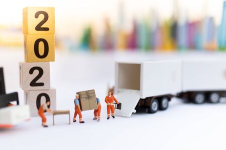 Miniature people : Worker move thing to destination place. Image use for logistic concept, shipment order from customerの写真素材
