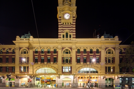 Elizabeth Street entrance to Flinders Street Station in Melbourne, Australia at night.のeditorial素材