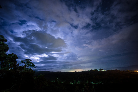 Thunderstorm clouds cover above the sky