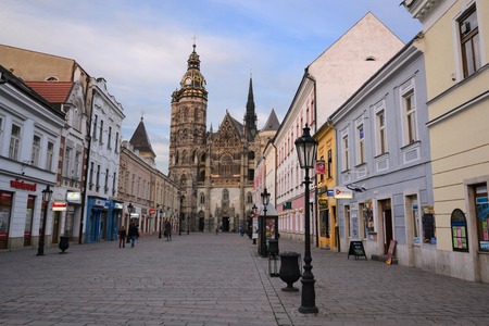 KOSICE, SLOVAKIA - april 11, 2015: Tourists walk through city center on April 11, 2015 in Kosice, Slovakia. Kosice is a city in eastern Slovakia with a population of approximately 240,000.のeditorial素材