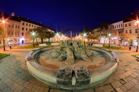 KOSICE, SLOVAKIA - April 11, 2015: Main street in city center with Fountain in the night in Kosice, Slovakia, April 11, 2015.のeditorial素材