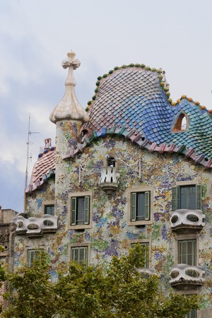Barcelona, Spain - 24 September, 2014: Exterior of Casa Batllo on September 24, 2014, a famous tourist destination restored by Catalan architect Antoni Gaudi. Gaudi  decorated the facade with mosaic tiles.のeditorial素材