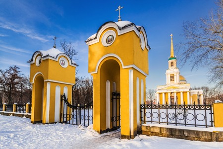 Beautiful Winter landscape of Peter and Paul Cathedral in the golden rays of the rising sun in the center of the Dnepropetrovsk city, Ukraineの写真素材