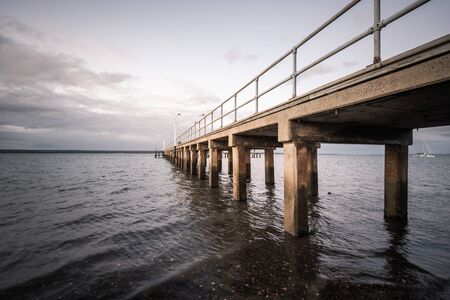 Corinella pier during the day from below.