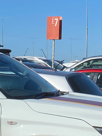 Vehicles parked at parking lotの写真素材