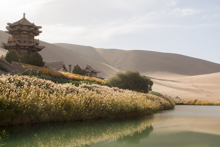 Chinese pavilion near Crescent Moon Lake in desert, Dunhuang, Chinaの写真素材