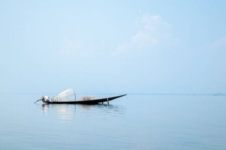 Fishing boat in Inle Lake,Shan State, Myanmarの写真素材
