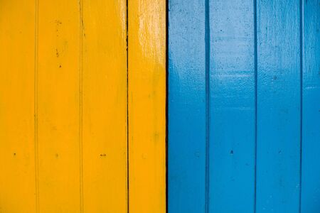 Blue and Yellow wood wallの写真素材