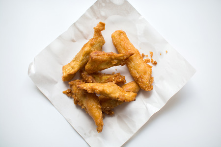 fried yams on paperの写真素材