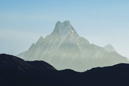 Mountain peak with blue sky in Nepal, cool color toneの写真素材