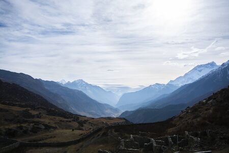 Mountain ranges with day light with clouds backgroundの写真素材
