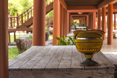 Buddist Monk's Arms Bowl. On the table, On the ground floor in Thai houseの写真素材