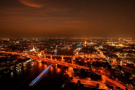 Cityscape, Panorama of Chao Phraya River. River view overlooking the Phra Phuttha Yodfa Bridge, Memorial Bridge and Wat Arun with grand Palace in the background, Bangkok Thailand. 26 January 2019のeditorial素材