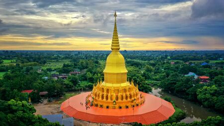 Wat Pa Wang Nam Yen. The biggest temple was mainly made of wood with 112 wooden pillars.  A new pagoda has been building in the area of the temple. Maha Sarakham province. Thailand.の写真素材