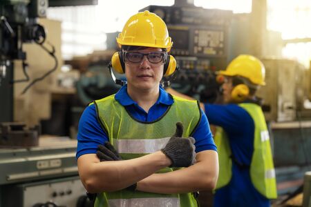 Everything is good concept. Technician or engineer in the factory showing the thumb. Well done....