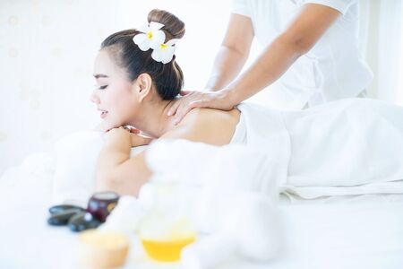 Female in spa. Young and healthy female in spa. Asian woman in wellness beauty spa having aroma therapy massage with essential oil. Thailand.の写真素材
