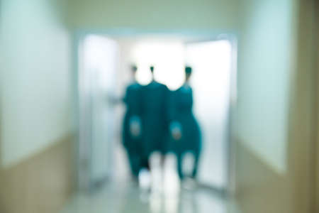 Blurred of the surgeon standing in front of the emergency room.
