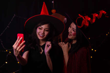 Young woman at Halloween. Halloween festival
