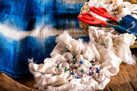 Craftsmen of Thai indigo cotton. Indigo tie dye. Original Indigo Cotton Weaving in the community of Sakon Nakhon province.の写真素材