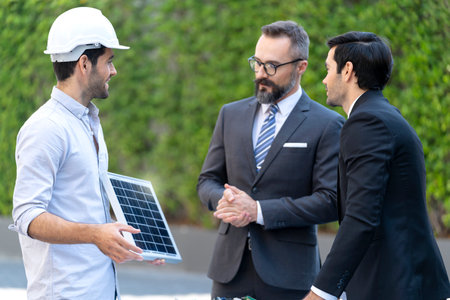 Engineer presenting the solar cell work for businessman. Engineer present new ecology project....