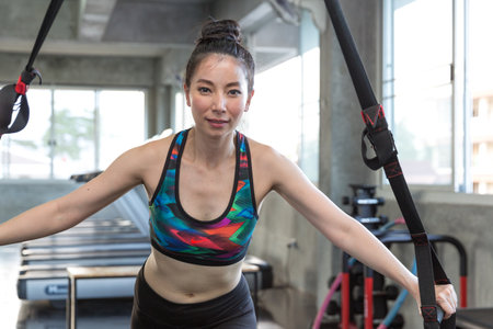 Asian women exercising in fitnessの写真素材