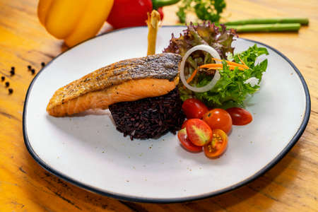 Salmon Don, Fusion Food. Braised grilled salmon with black rice.の写真素材