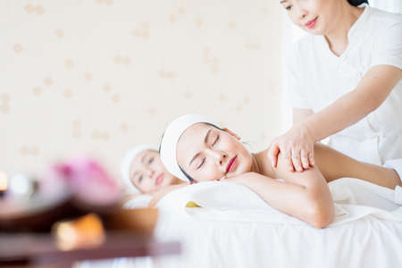 Yougn woman relaxing with hand spa massage at beauty spa salon.の写真素材