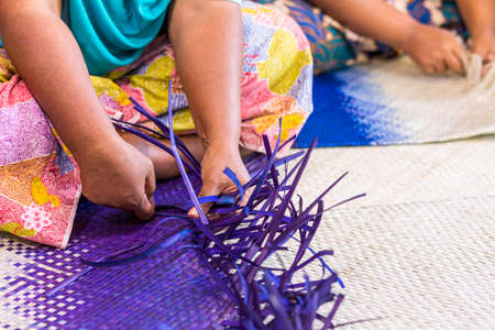 Craftsmen weaving Toei Panan. A southern craft product that has transformed Toei Panan into a lifestyle product.の写真素材