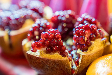 Pomegranate Juice. Peeled pomegranate fruit for juicing.の写真素材
