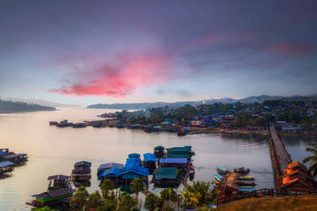 Mon Bridge is the long wooden bridge. Official name is Attanusorn Bridge. Sangkhla Buri, Kanchanaburi, Thailandの写真素材