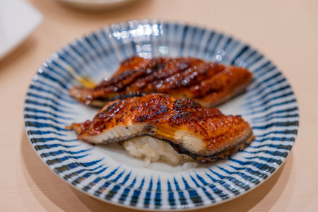 Japanese food style. Eel sushi served on a plate. Eel sushi roll maki.の写真素材