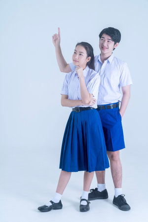 Asian school boy and girl have idea. Boy and girl of school with with formulas and idea.の写真素材
