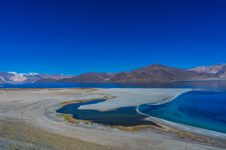 Blue lake Pangong with surrounding mountains in great tibet area Leh Ladakh, North India.の写真素材