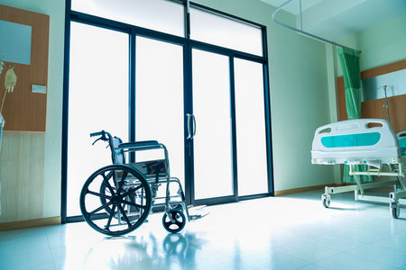 Patient trolley in hospital ward. wheel chair. Wheelchair empty wait to use at hospital.の写真素材
