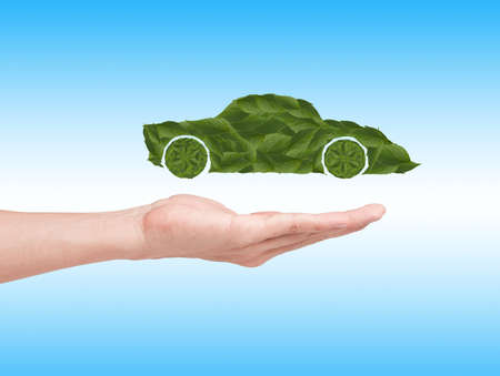 Green eco car concept on handの写真素材