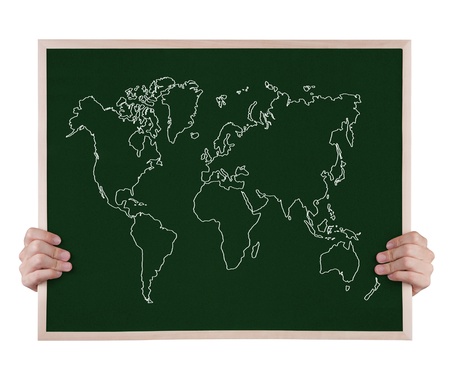 world map on blackboard with handsの写真素材