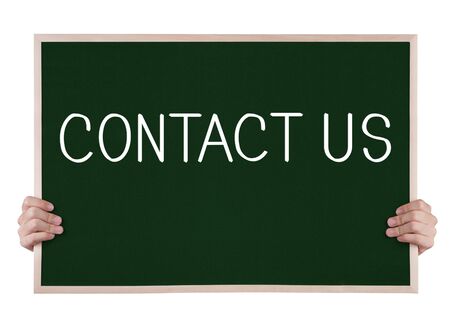 contact us  on blackboard with handsの写真素材